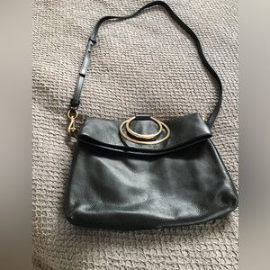 Black pebbled leather two section crossbody purse with gold tone hardware